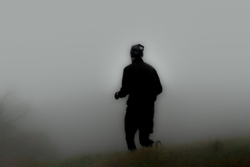 Jogger im Nebel Webfoto-Oberland